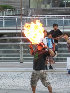 Crazy Street Performer below Landmark Tower